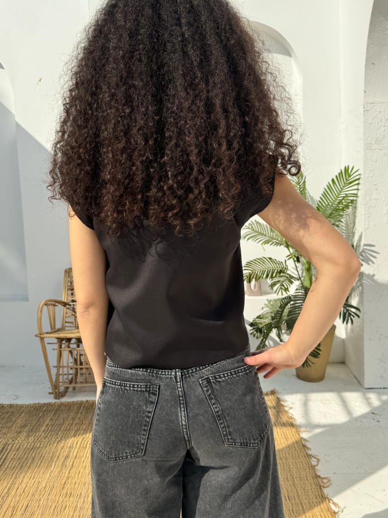 Black sleeveless double breasted vest