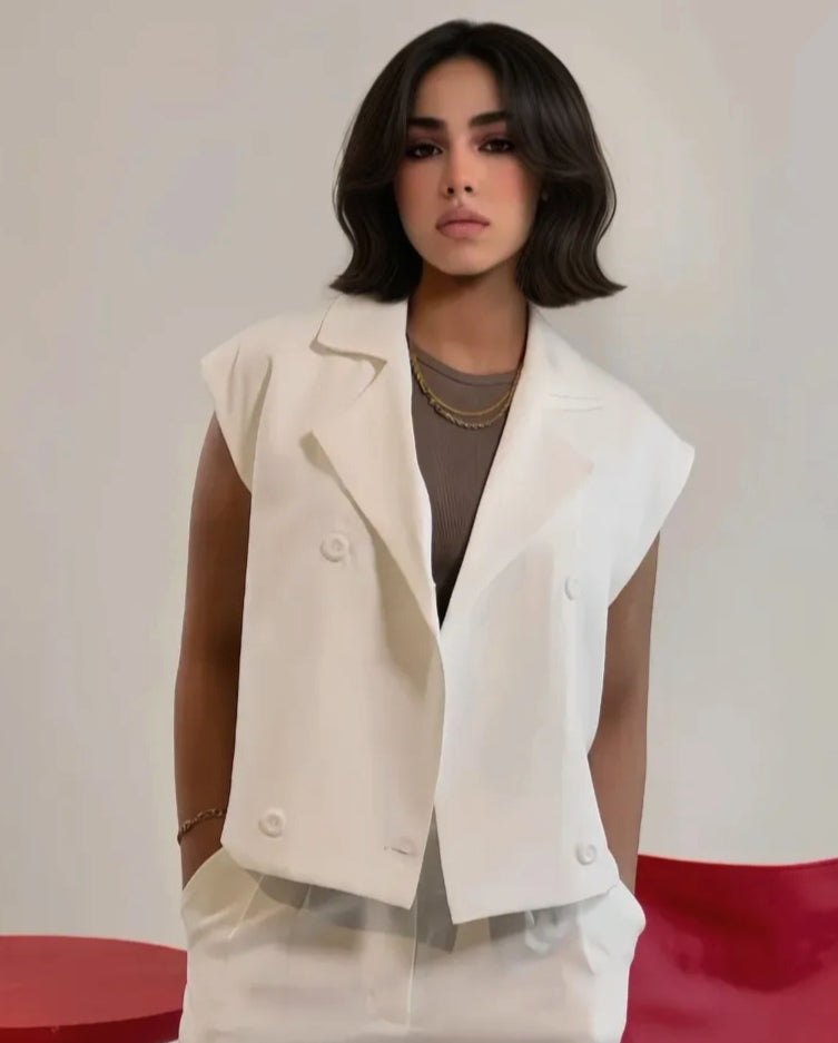 Cream sleeveless double breasted vest