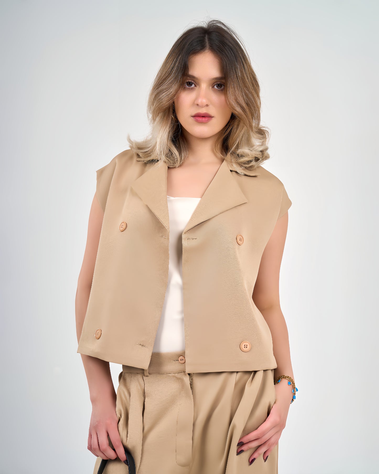 Beige sleeveless double breasted vest