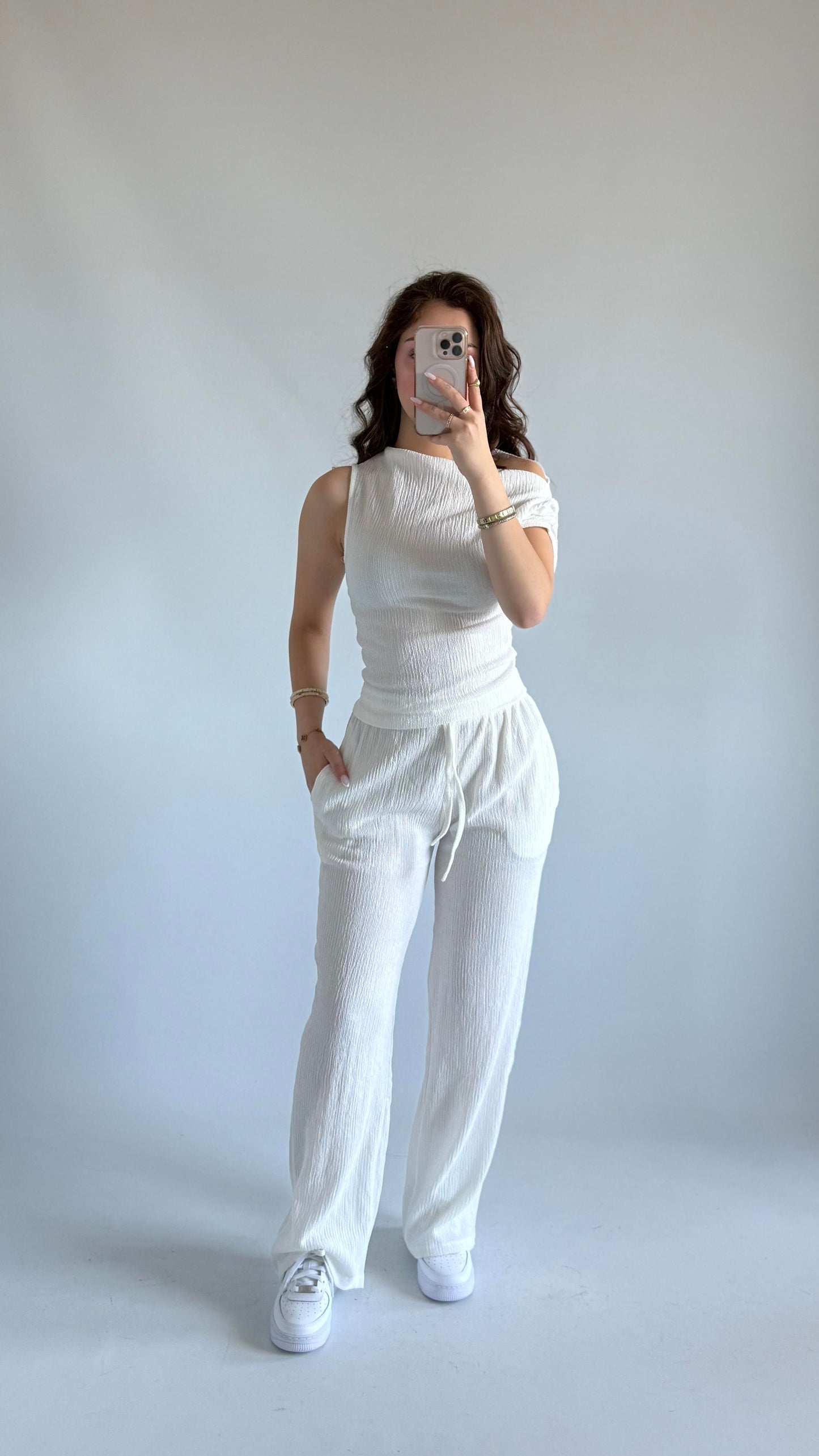 White asymmetric blouse pants suit