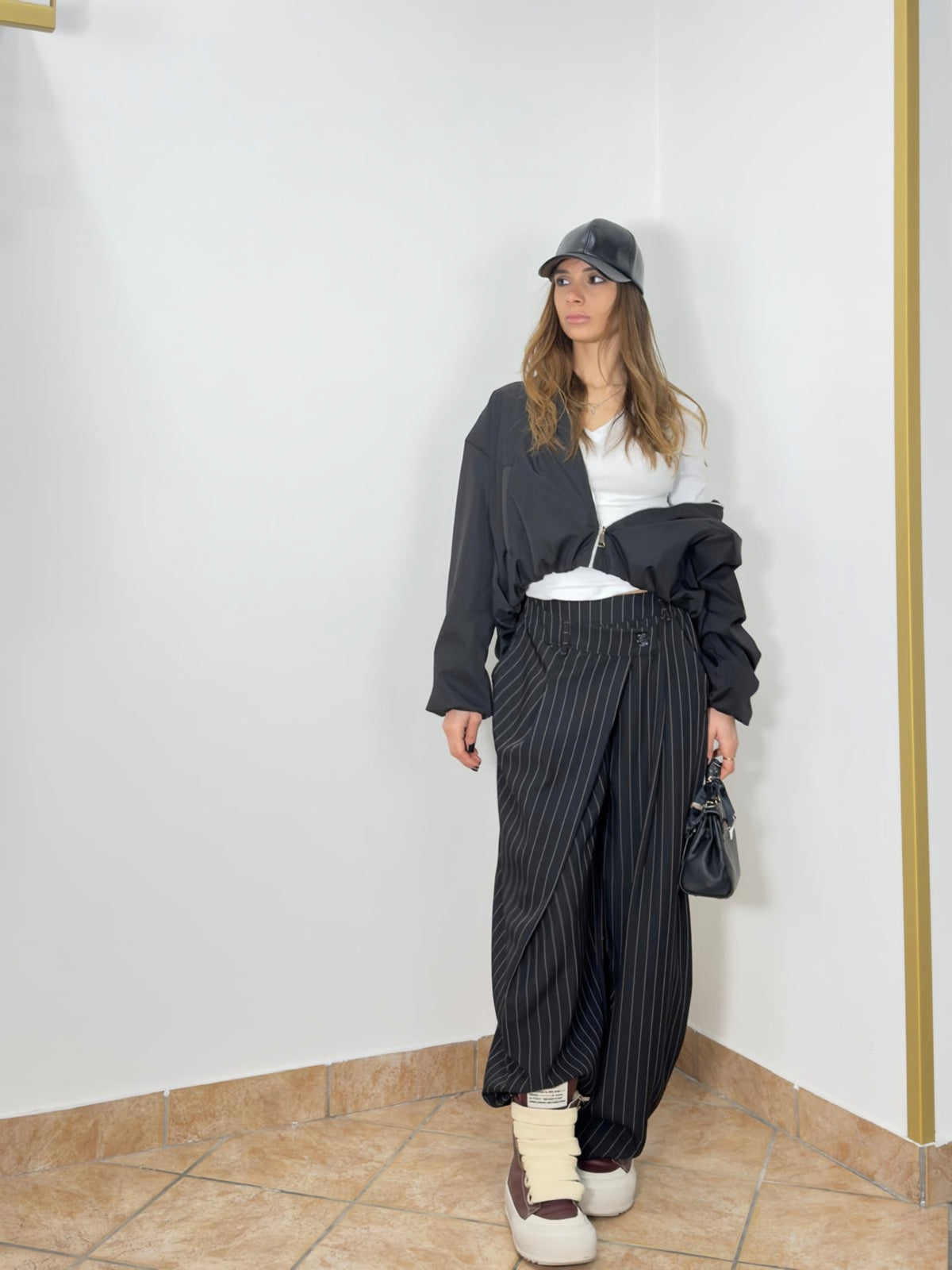 Striped trousers with wrap details