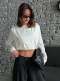 White long sleeve cropped top