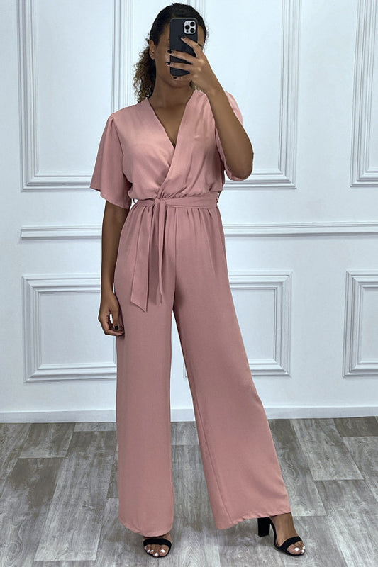 Pink palazzo jumpsuit with wrap-style voile