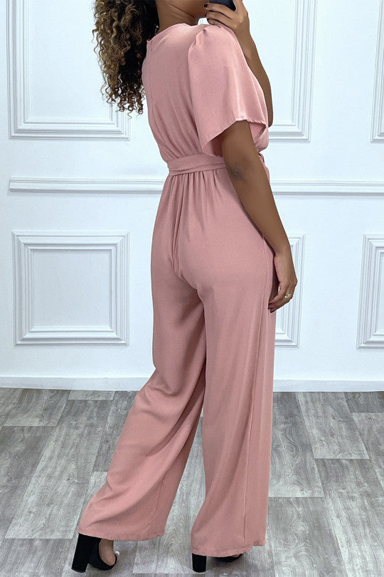 Pink palazzo jumpsuit with wrap-style voile