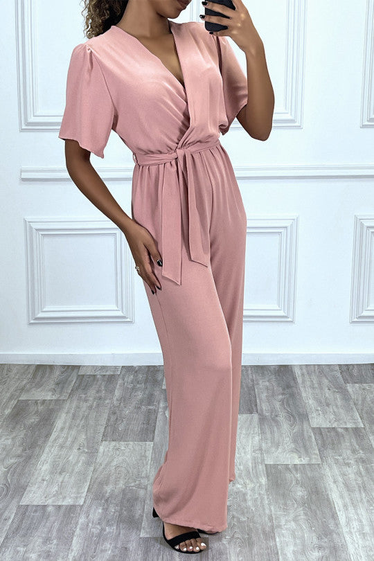 Pink palazzo jumpsuit with wrap-style voile