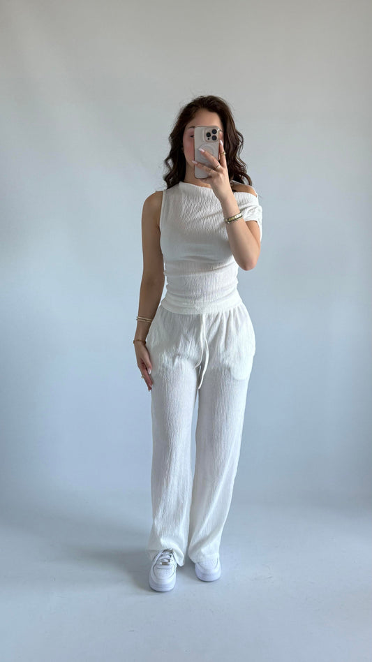 White asymmetric blouse pants suit