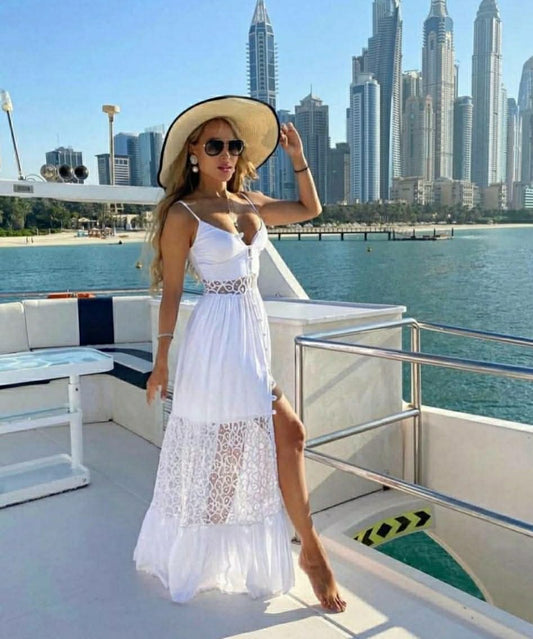 Long white dress with lace details and thin straps