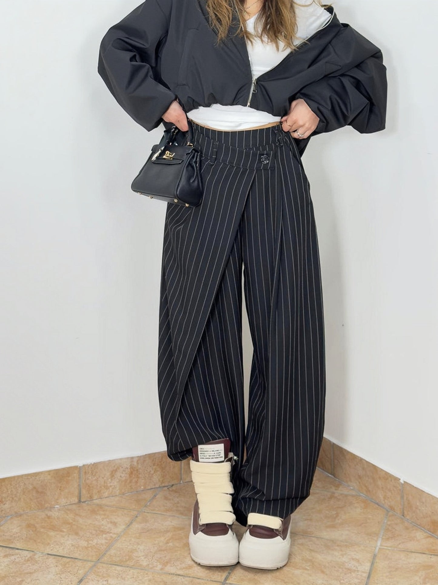 Striped trousers with wrap details