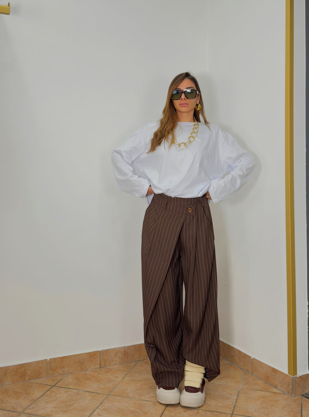 Striped trousers with wrap details