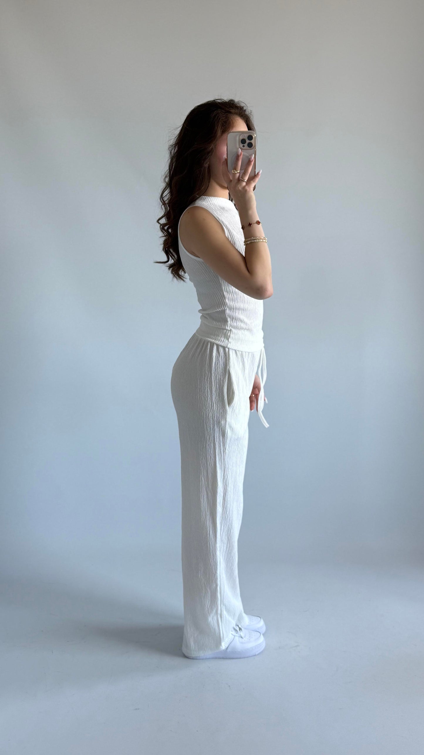 White asymmetric blouse pants suit